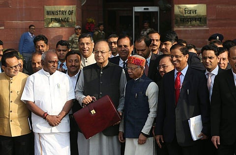 Union Finance minister Arun Jaitley holding a briefcase containing federal budget documents leaves his office to present the same in Parliament in New Delhi on Thursday. (Express Photo Service | Shekhar Yadav)