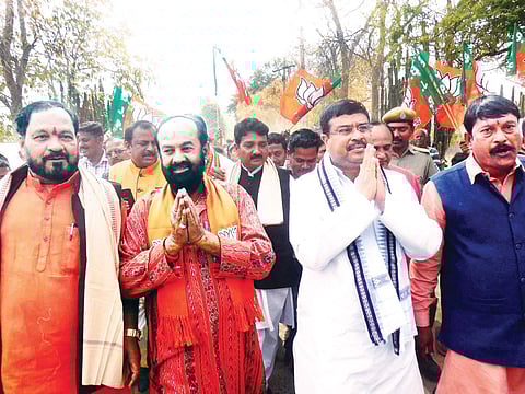 Union Minister Dharmendra Pradhan, BJP state president Basant Panda and party candidate for Bijepur by-poll Ashok Panigrahi during campaign on Sunday | Express