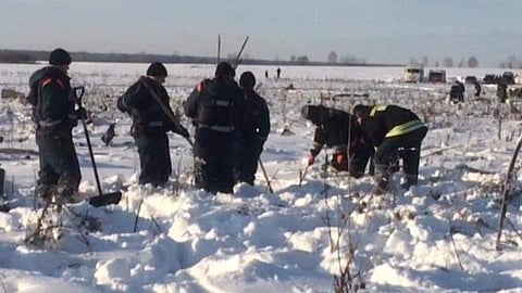 Investigators try to determine cause of fatal Russia plane crash.