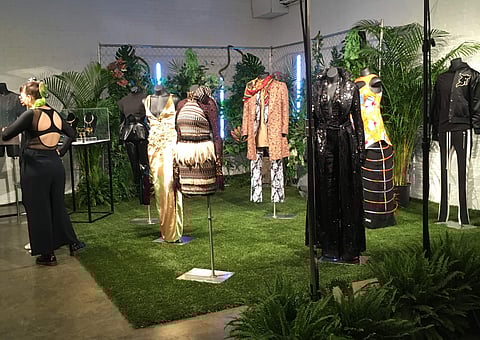 Fashion from a small collection inspired by the upcoming superhero film “Black Panther,” are displayed in New York on Monday, Feb. 12, 2018. | AP