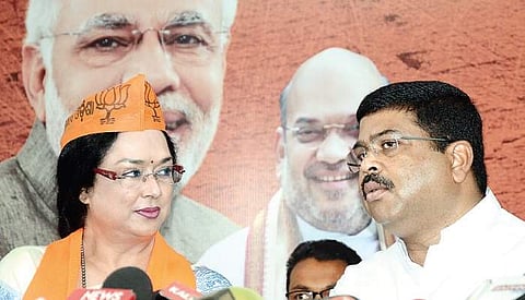 Veteran Ollywood actor Mahasweta Ray with Union Minister Dharmendra Pradhan after her induction to the BJP in Bhubaneswar on Monday ceremony | Express