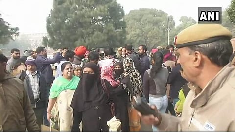 In this file photo, a demonstration is seen outside the parliament in support of the Triple talaq bill. (Twitter Photo | ANI)