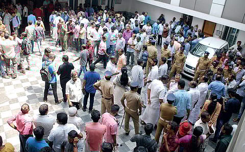 People who gathered on the Medical Trust Hospital premises after they came to know about the blast | K SHIJITH