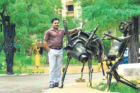 K A Babu with the bull and bull tamer installation