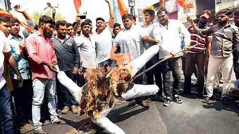 Members of the Bajrang Dal burn Saint Valentine at Abids;