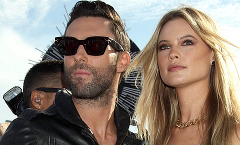 Adam Levine with wife Behati Prinsloo. (Photo: YouTube)