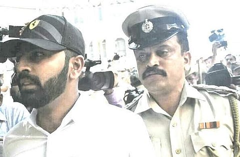 Mohammed Nalpad Haris, accused of assaulting a 24-year-old youth at a restaurant surrendered before the Cubbon Park police.