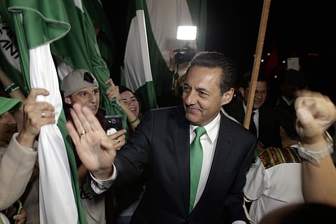 Presidential candidate Antonio Alvarez Desanti with the National Liberation party greets supporters after he attended a live, televised debate ahead of the presidential election in San Jose, Costa Rica | AP