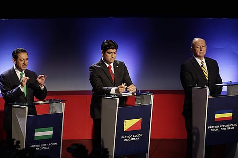 Antonio Alvarez Desanti of the National Liberation party, left, answers a question during a live, televised debate ahead a the presidential election in San Jose, Costa Rica | AP