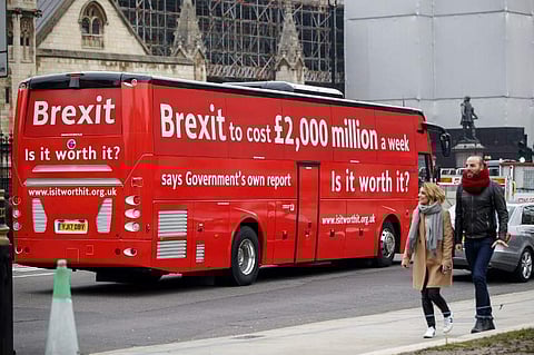 The Brexit Facts Bus, rolled out by European Union advocates as they kick off a new initiative against Brexit, drives around Parliament Square in central London. | AFP