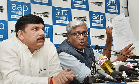 AAP Rajya Sabha MP Sanjay Singh with party's spokesperson Ashutosh addresses a press conference in New Delhi on Wednesday. | PTI