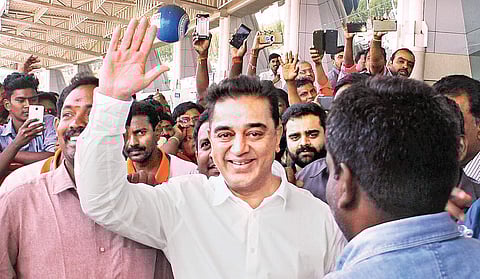 Actor Kamal Haasan arriving at Madurai airport for his party launch at Rameswaram, on Tuesday. (EPS | K K Sundar)
