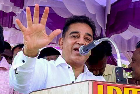 Veteran actor Kamal Hassan speaks during his day-long road show at Manamadurai in Sivaganga district on Wednesday. The actor is all set to launch his political party in Madurai. | PTI