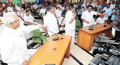 Kannur DCC president Satheeshan Pacheni arguing with CPM Kannur district secretary P Jayarajan at the peace meeting held at Kannur collectorate conference hall | Express