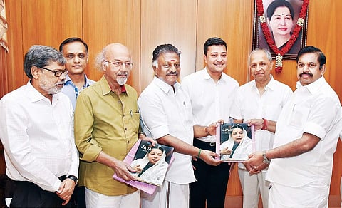Chief Minister Edappadi K Palaniswami handing over the first copy of a book ‘Jaya: An Incredible Story’ brought out by TNIE to Deputy Chief Minister O Panneerselvam after releasing it, as (from right) TNIE Group CMD Manoj Kumar Sonthalia, GM-TN Siddharth