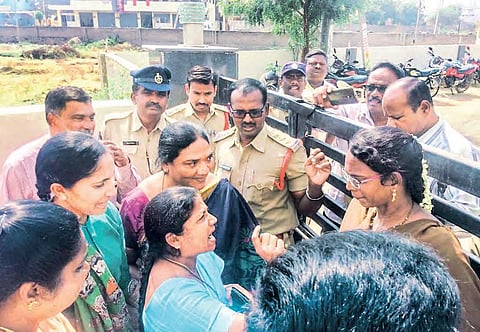 Kurnool Bar Association president V Nagalakshmi Devi arguing with the police over her house arrest on Thursday. (Below) The ‘detained’ advocates at a police station in Kurnool district | Express
