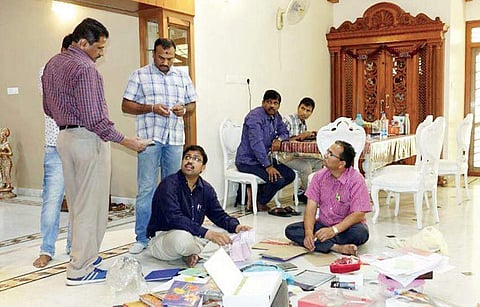 ACB officials during the raid at Purushotham Reddy’s house in Hyderabad on Sunday | express