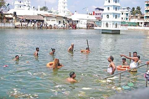 Rescue personnel searching for Sheikh Munna in the Nagore dargah tank | Express