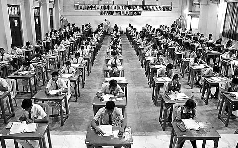 Students writing English paper at an examination centre in Bhubaneswar on Monday | shamim qureshy