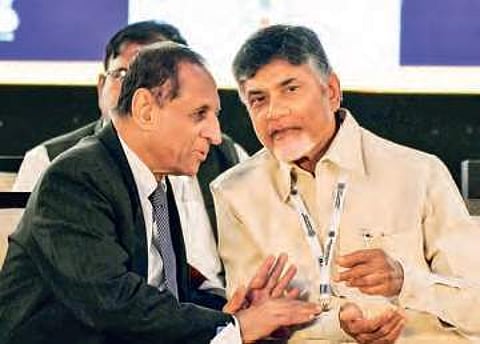 Governor ESL Narasimhan and CM Chandrababu Naidu at the CII Summit in Vizag on Monday | Express