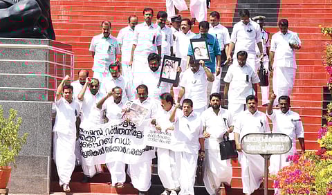 UDF MLAs staging a protest in front of the Assembly in Thiruvananthapuram on Monday | Express