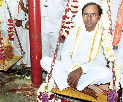 Chief Minister K Chandrasekhar Rao being weighed against jaggery during the Medaram Jatra, in Warangal on Friday | express photo