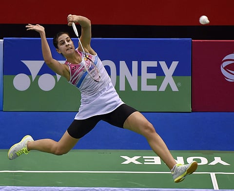 Spain's badminton player Carolina Marin in action against China's Gao Fangjie during Women singles match during the Dr. Akhilesh Das Gupta India Open 2018 at Siri Fort Indoor Stadium in New Delhi on Thursday. | PTI