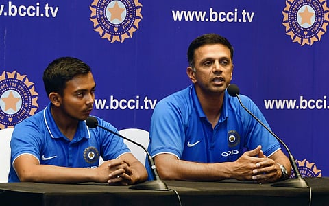 Under-19 Cricket World Cup winning team coach Rahul Dravid and captain Prithvi Shaw during a press meet after their arrival in Mumbai. (PTI)