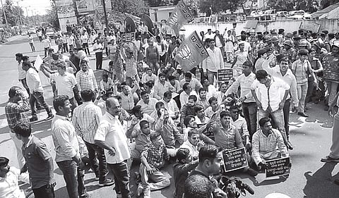 BJP activists staging protest in front of Naveen Nivas on Monday | Express