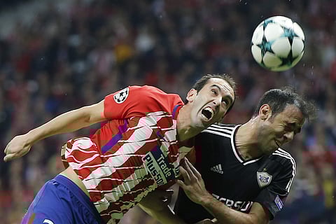 Atletico Madrid defender Diego Godin (L) (File | AP)