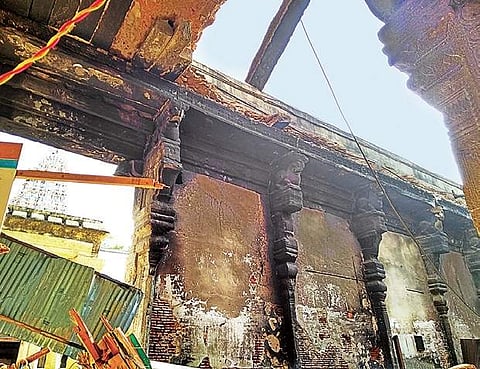 The Veera Vasantharayar Mandap in the Madurai Meenakshi Amman Temple on Monday; (inset) Deputy Chief Minister O Panneerselvam at the temple | Express