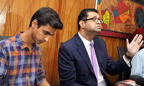 Anuj, son of late Justice Loya, at a press conference along with other family members and their lawyer Ameet Naik | PTI Photo