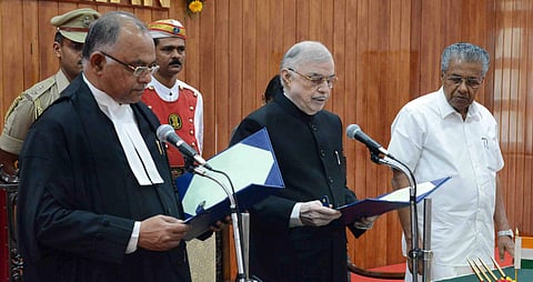 Governor P Sathasivam administering oath of office to new chief justice Antony Dominic.(EPS | Kaviyoor Santhosh P)