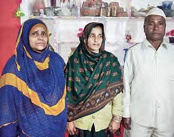 Mohammadi Begum with her parents at her house in Old City on Wednesday | Express