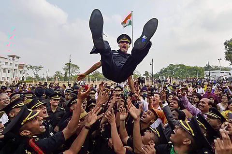 Cadets lift a colleague as they celebrate after a passing-out parade at Officers Training Academy OTA in Chennai. | PTI