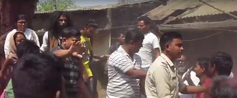 Police trying to prevent clashes between TMC supporters and Visva-Bharati University students at Shyambati of Santiniketan in Birbhum district of West Bengal on Friday evening. | Express Photo Services
