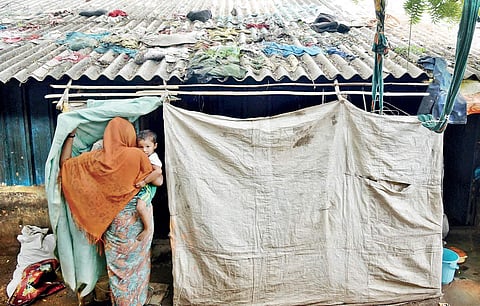 A representative picture of a Muslim woman with her child, in Hyderabad | EPS