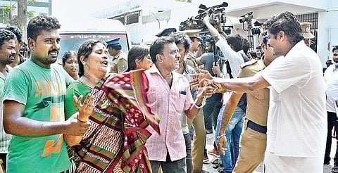 Inconsolable relatives of M Ashwini, who was killed by a stalker, on the Kilpauk Medical College mortuary premises on Saturday | EPS