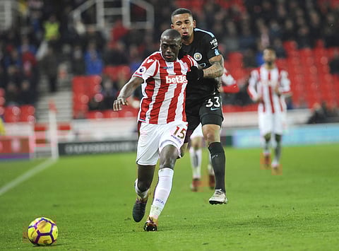 Manchester City's Gabriel Jesus, right, and Stoke's Bruno Martins Indi battle for the ball during the English Premier League soccer match between Stoke City and Manchester City at the Bet 365 Stadium in Stoke on Trent, England, Monday, March 12, 2018. |
