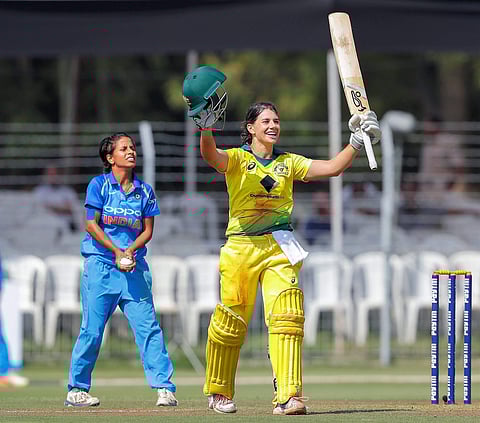 Australia woman cricketer Nicole Bolton celebrates after scoring a century during the first ODI of the ICC Women's Championship against India at Vadodara on Monday. | PTI