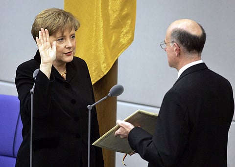 German chancellor Angela Merkel takes the oath of office in the parliament in Berlin (File | AP)
