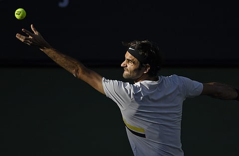 Roger Federer, of Switzerland, serves to Jeremy Chardy, of France, at the BNP Paribas Open tennis tournament Wednesday, March 14, 2018, in Indian Wells. (AP)