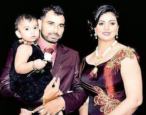Mohammed Shami is seen with his wife Hasin Jahan and daughter Aairah (File | EPS)