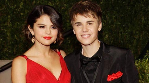 Selena Gomez with Justin Bieber. | AP