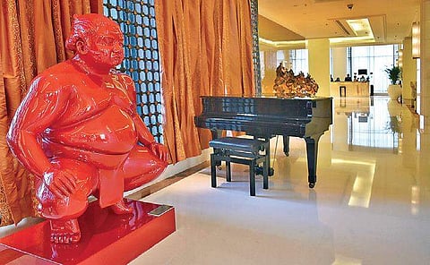French sculptor Alexandra Gestin’s work inspired from Japanese sumo wrestlers; (right)Robert St Croix’s Pablo Picasso