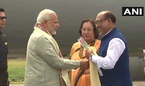 Manipur Governor Najma Heptulla, CM N Biren Singh receive PM Modi at Imphal. (Photo | Twitter/ANI)