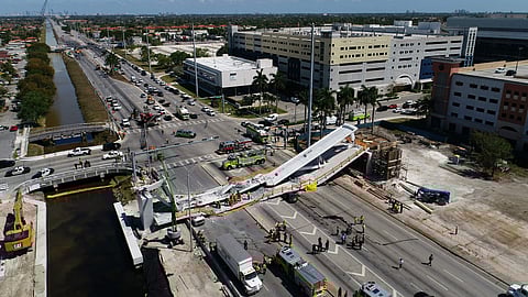 A newly installed 950-ton pedestrian bridge collapsed onto a highway at Florida International University in Miami on Thursday, March 15, 2018. According to latest updates, six people were killed in the collapse which also crushed several vehicles. (AP)