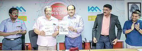 KMRL MD A P M Mohammed Hanish releasing KMRL newsletter by handing over a copy to WRI India CEO O P Agarwal in Kochi on Friday. Smart City Kochi CEO Manoj Nair and WRI director Madhav Pai look on
