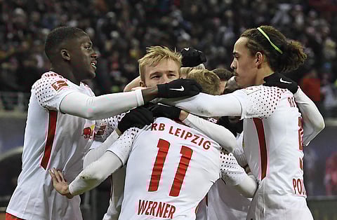 RB Leipzig's Timo Werner, center, celebrates together with his teammates after scoring a goal during the German first division Bundesliga soccer match against Bayern Munich. | AP