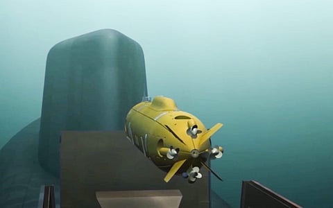a computer simulation shows a Russian nuclear-powered underwater drone being released by a submarine. | AP